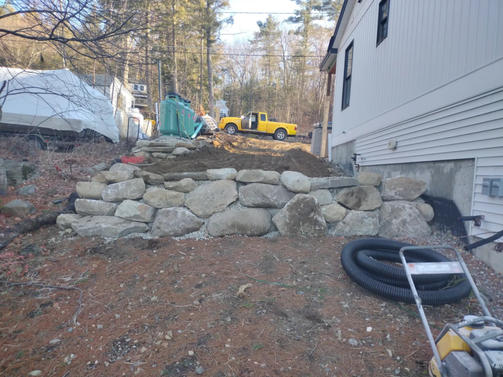 Boulder Retaining Wall and Drainage
